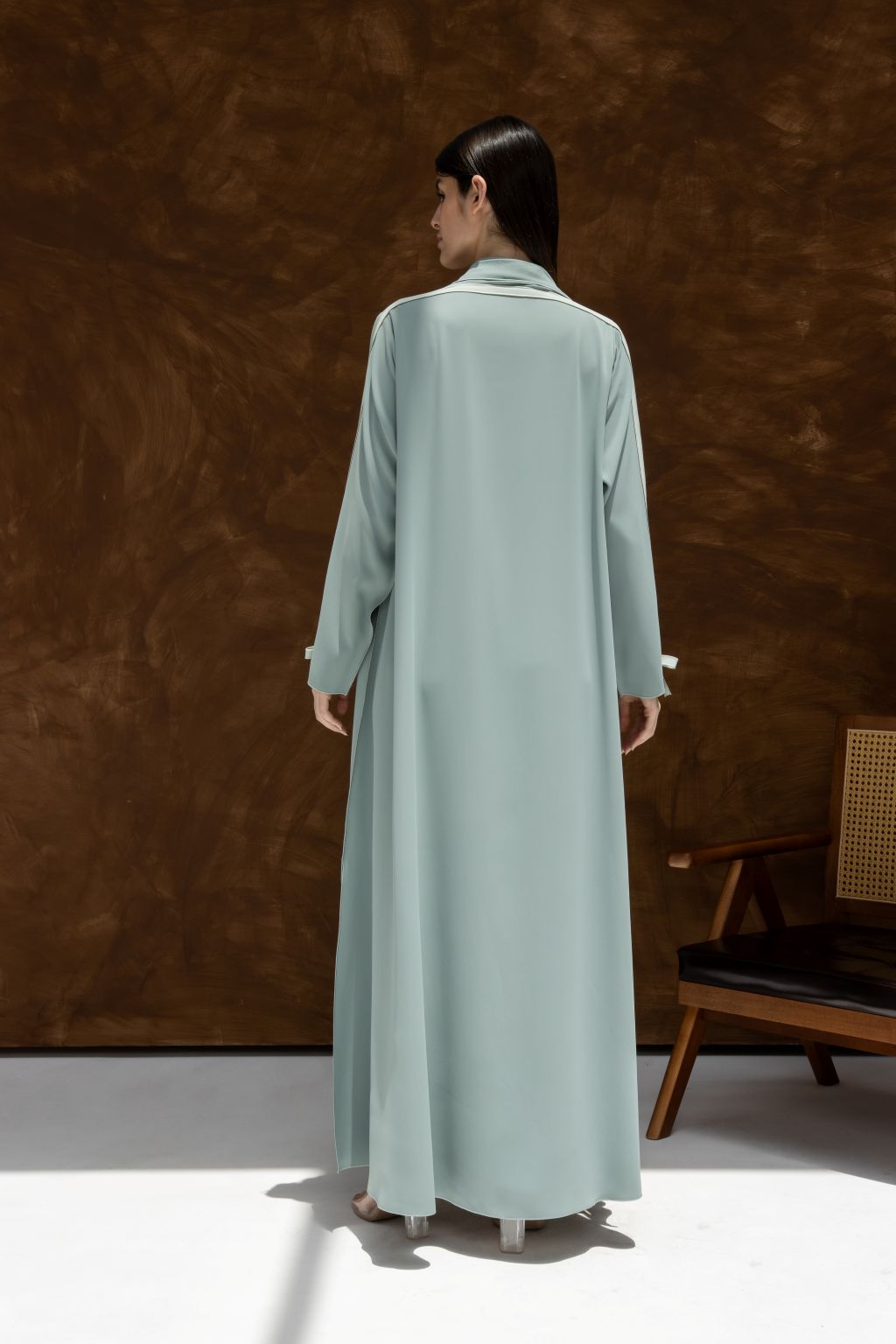 Back view of luxury modest Fionka Belle abaya by Selected Lines in soft pastel green fabric