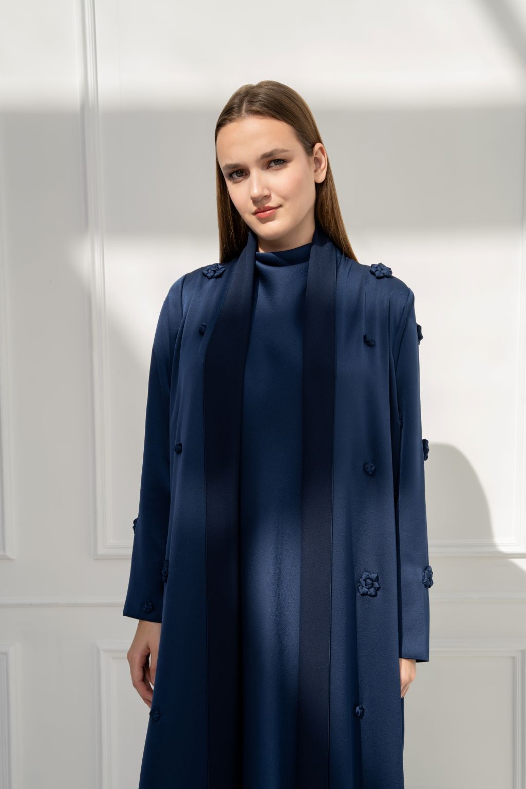 Luxury navy long coat for women by Selected Lines with floral embellishments and a sleek design