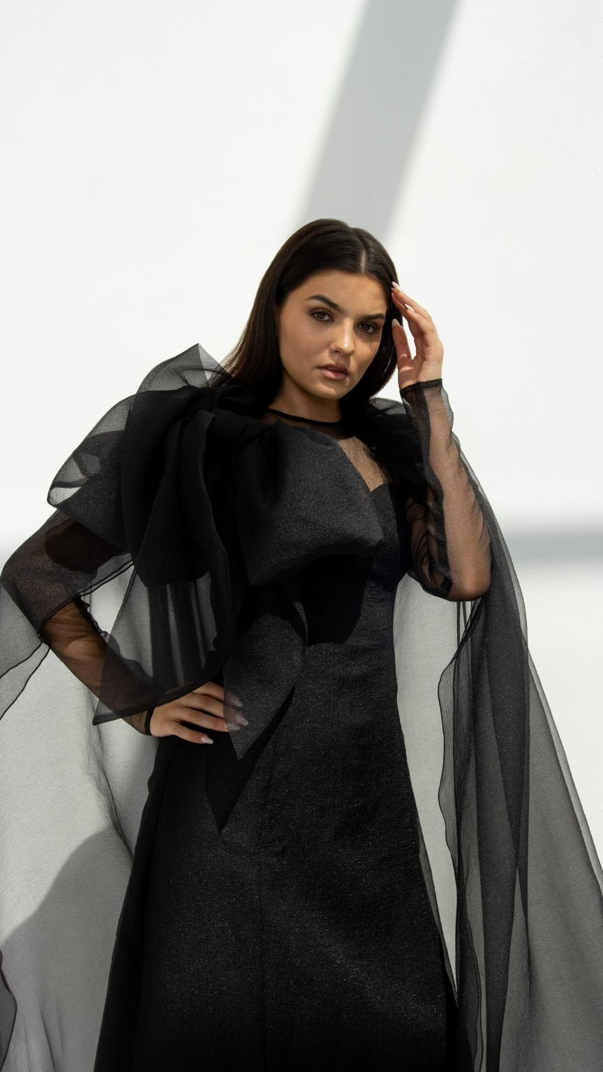 Elegant black luxury organza abaya by Selected Lines with sheer sleeves and flowing fabric