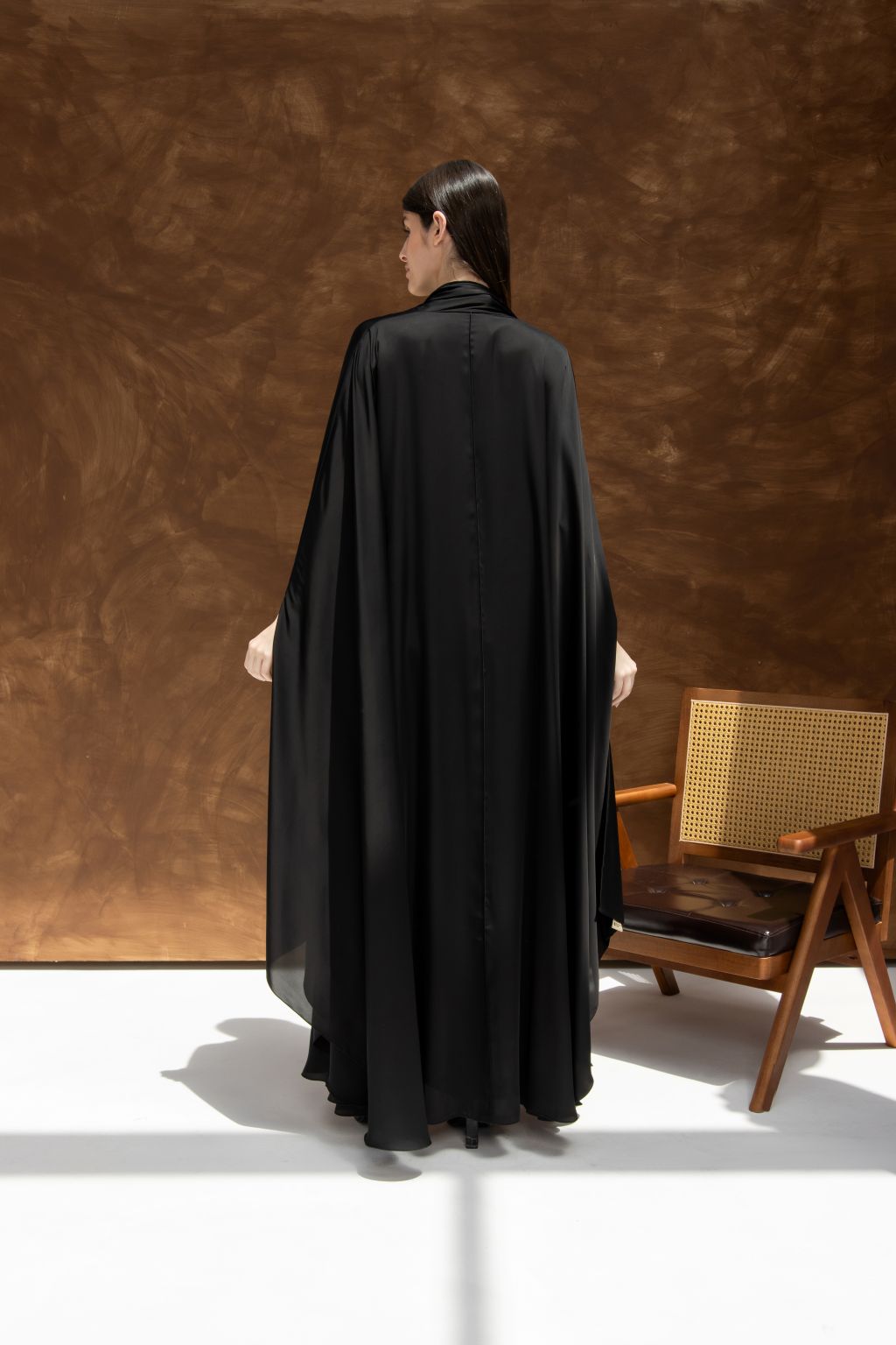 Elegant black luxury silk abaya with flowing design, perfect for special occasions and everyday wear