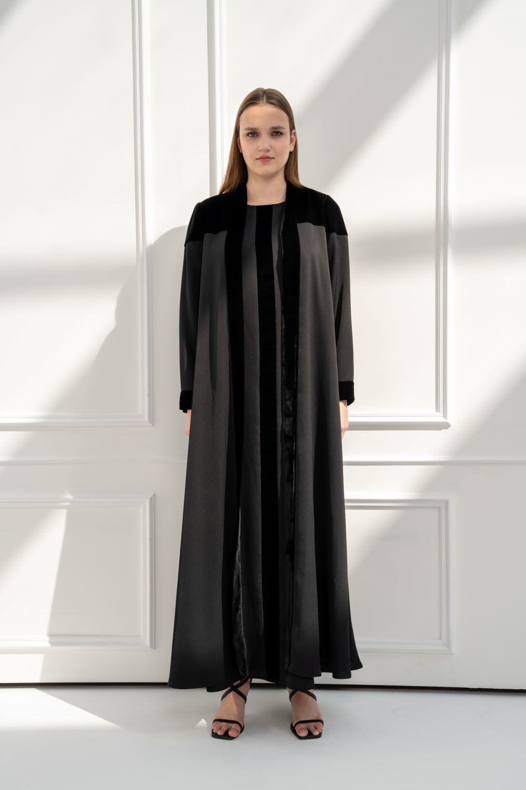 Elegant black luxury velvet abaya by Selected Lines with sleek design and long sleeves