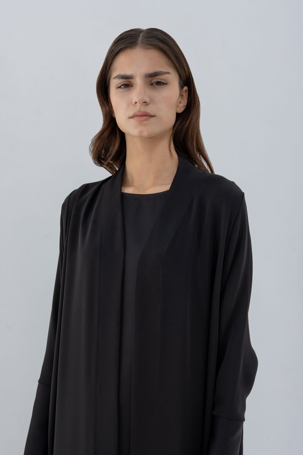 Selected Lines luxury women's abaya in black with a minimalist design and long sleeves