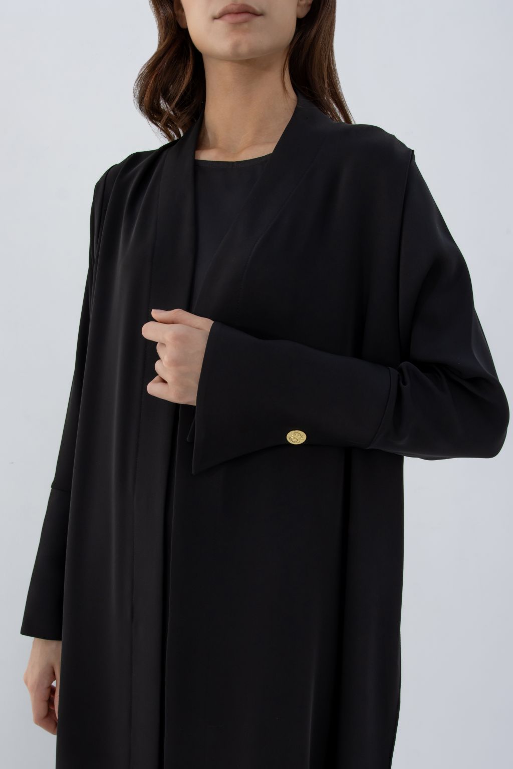 Selected Lines black luxury women's abaya with long sleeves and gold button detail