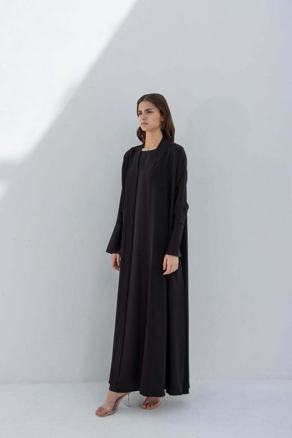 Selected Lines luxury women's abaya in black with long sleeves and flowing design