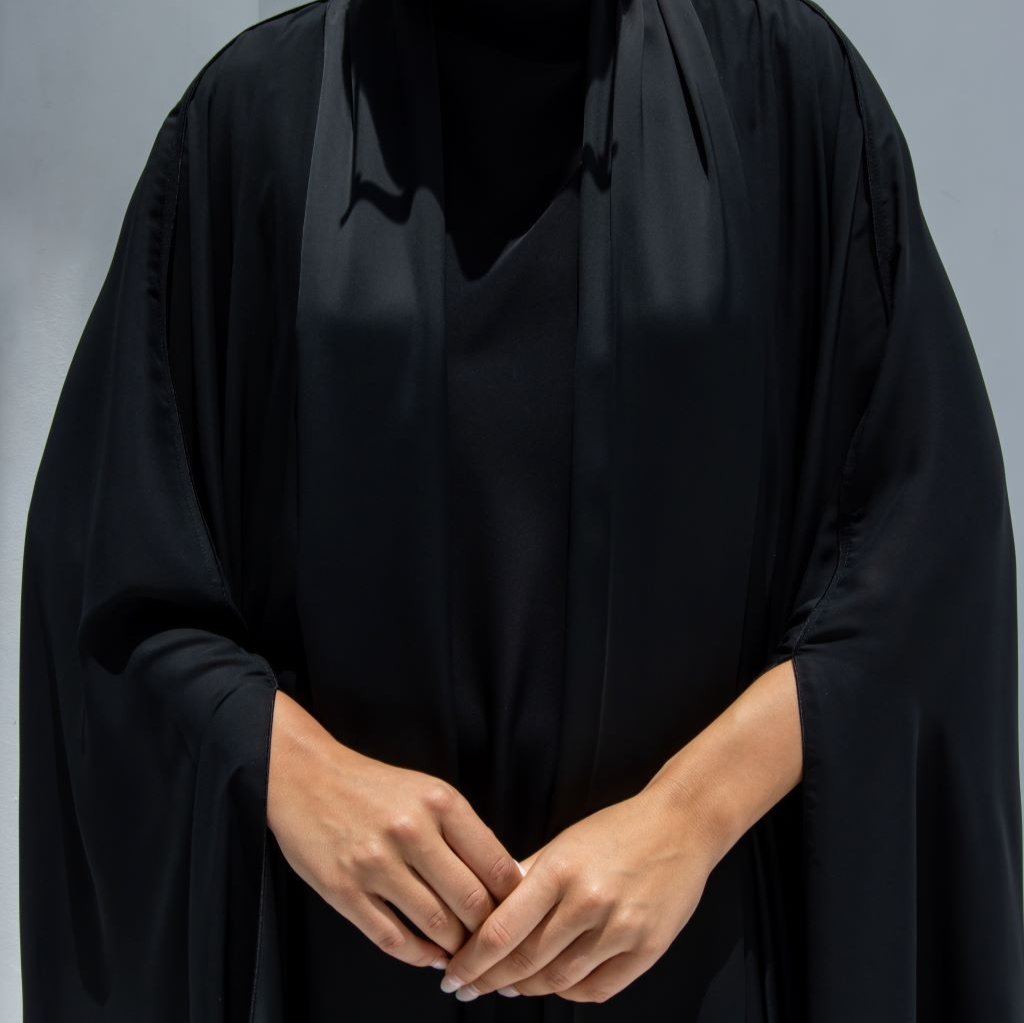 Close-up of Mermaid Abaya’s intricate stitching and high-quality black silk material | Selected Lines