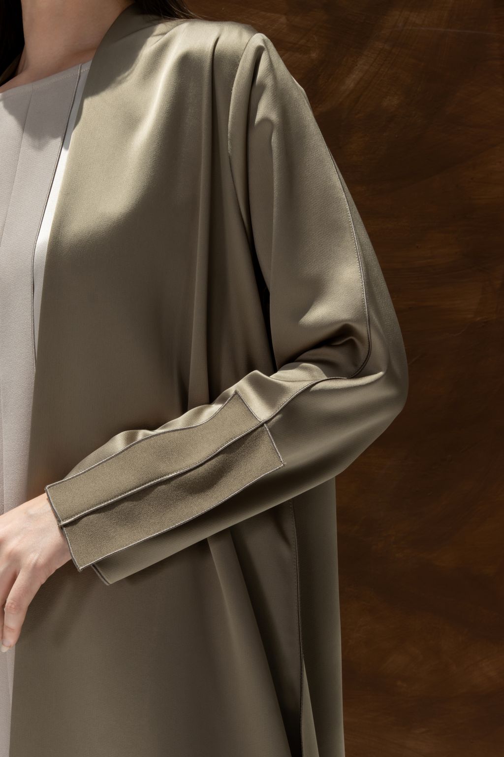 ModiSquare luxury abaya for women by Selected Lines in smooth olive fabric with detailed sleeve design