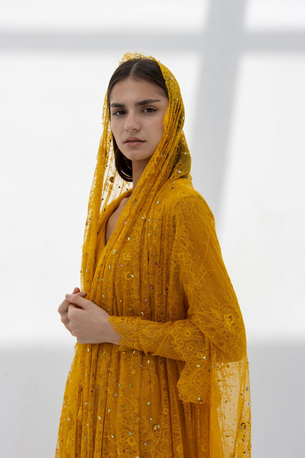 Front view of Munera Abaya in mustard dantel fabric | Selected Lines