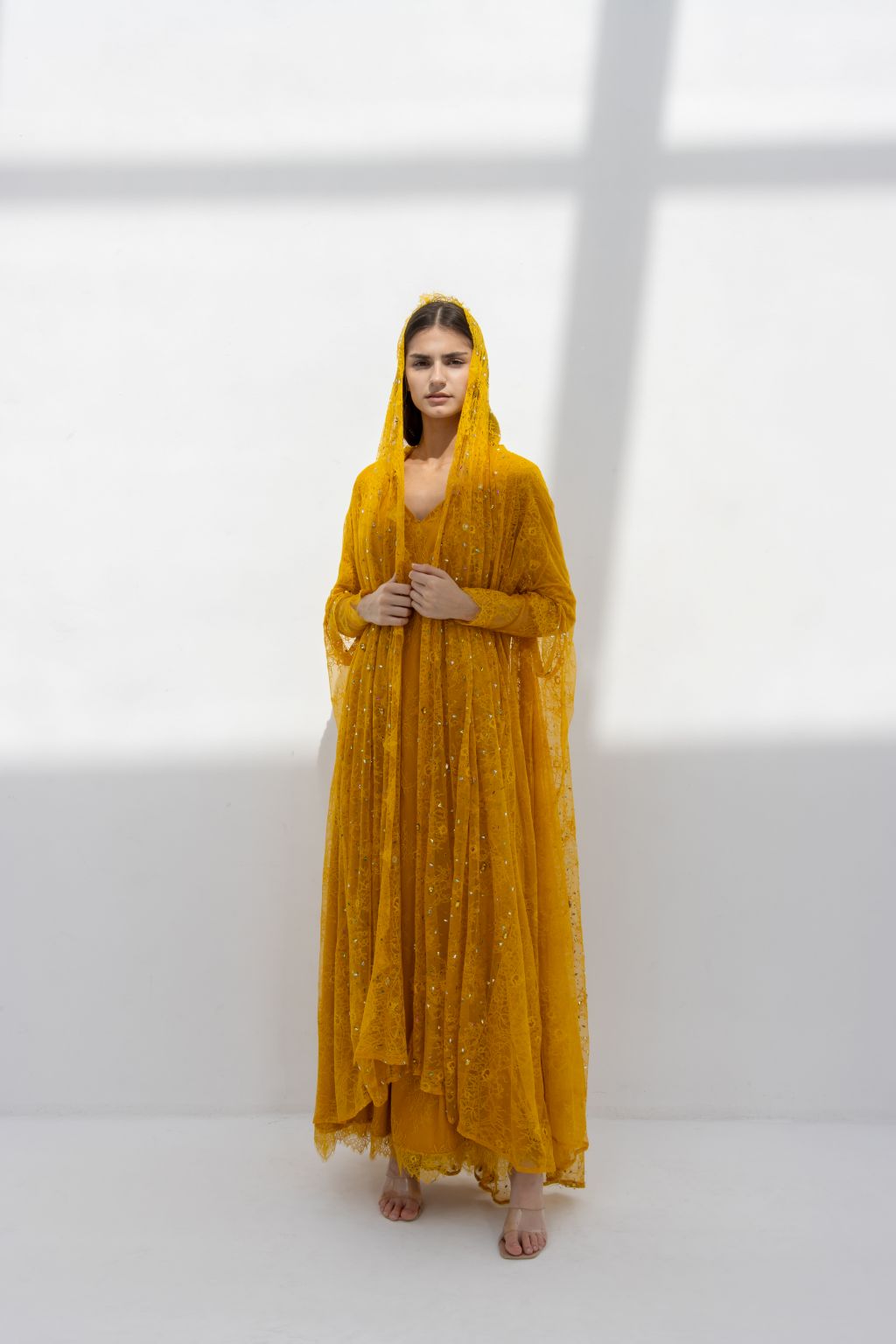 Munera Abaya styled with coordinating inner dress in mustard dantel | Selected Lines