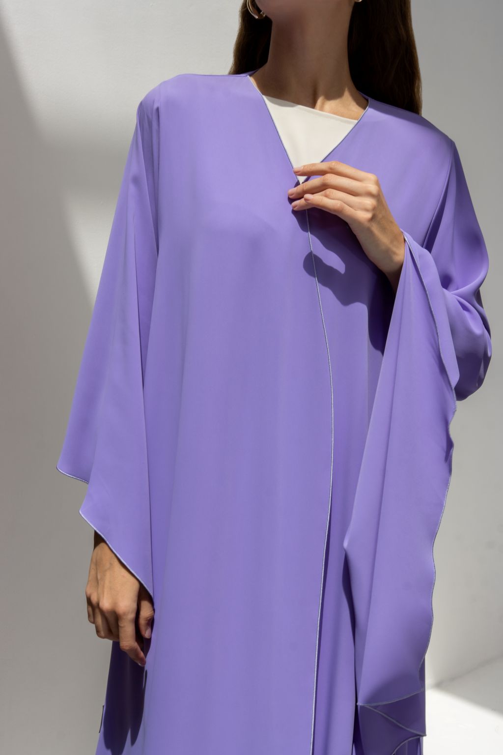 Selected Lines lavender abaya featuring the elegant Onz SLC Signature robe with flowing wide sleeves