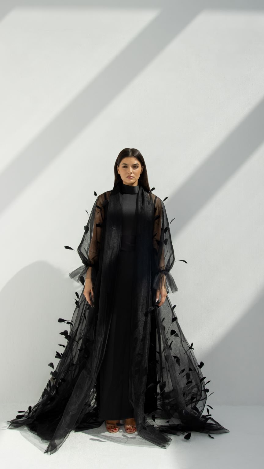 Front view of Plume Abaya in black tulle fabric with delicate feather design | Selected Lines