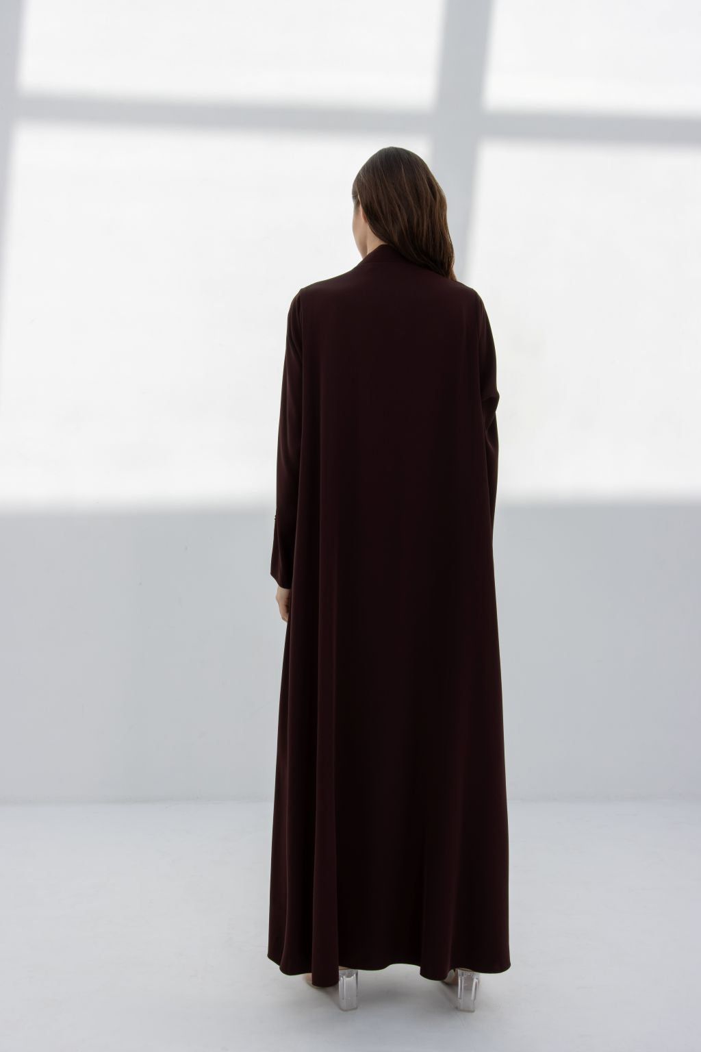 Elegant premium handcrafted abaya in deep burgundy, designed for stylish modest wear.