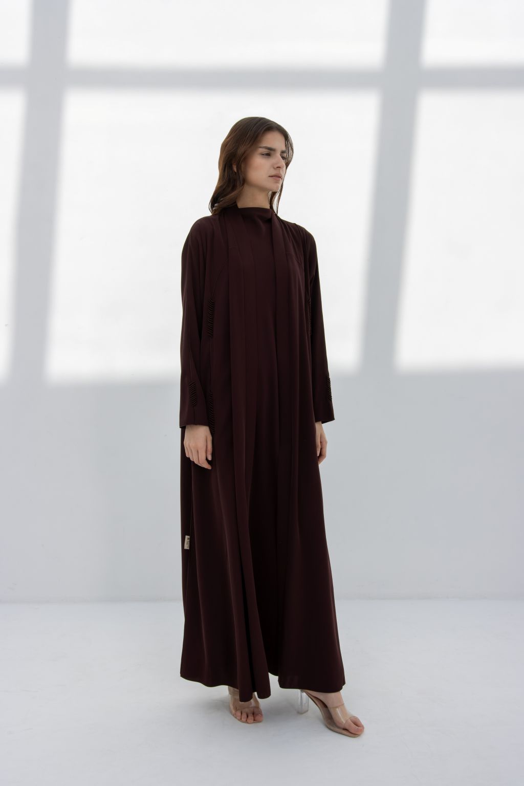 Elegant maroon premium handcrafted abaya with flowing fabric for stylish modest fashion
