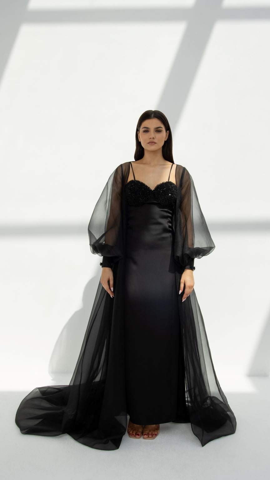 Front view of Puff Occasional Abaya featuring black organza fabric with sparkling embellishments | Selected Lines