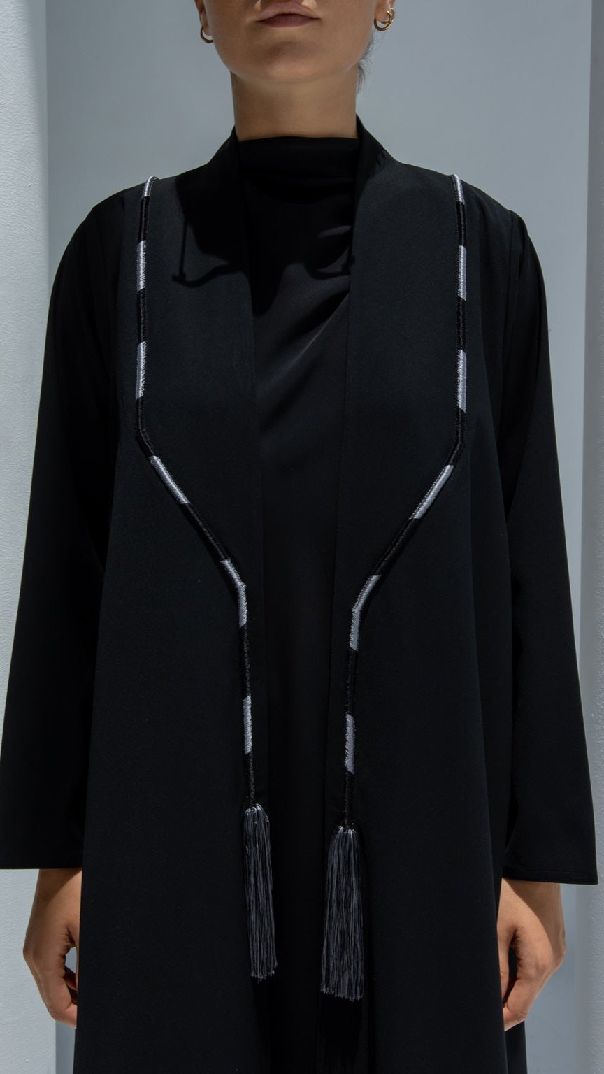 Front view of Rope Abaya in black Nada fabric with elegant rope-style design | Selected Lines