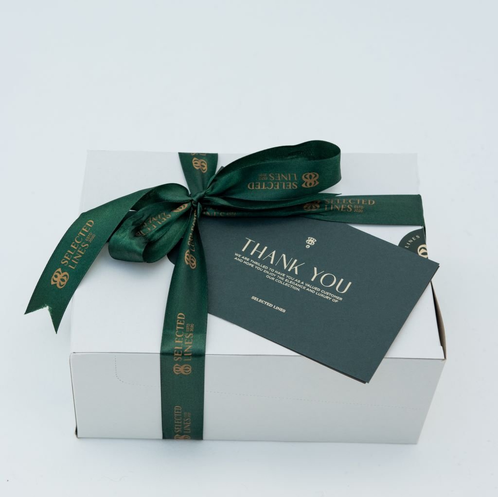 Selected Lines gift box containing high quality wet wipes with a decorative ribbon and thank you card