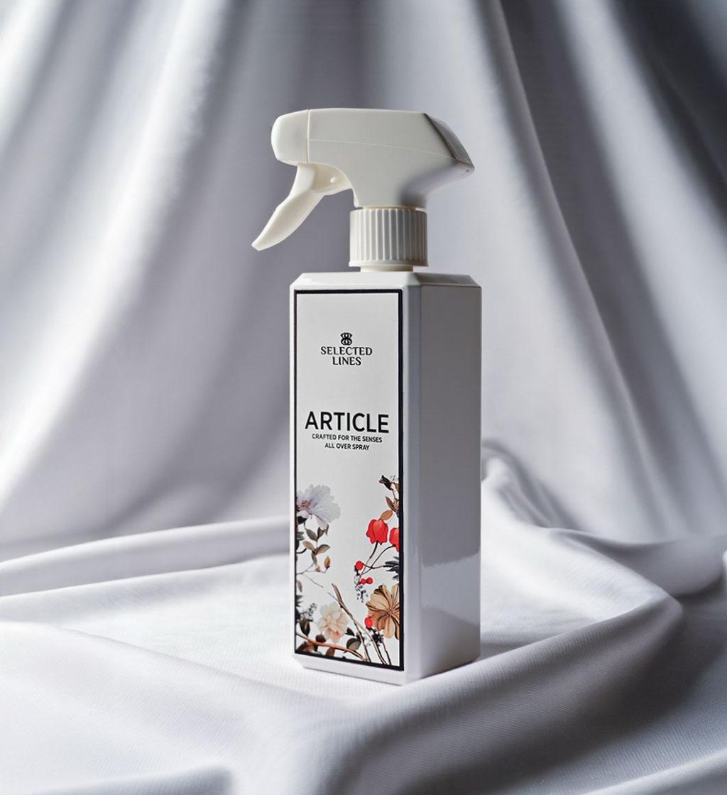 Selected Lines premium clothing spray for luxury garments in elegant spray bottle on soft fabric