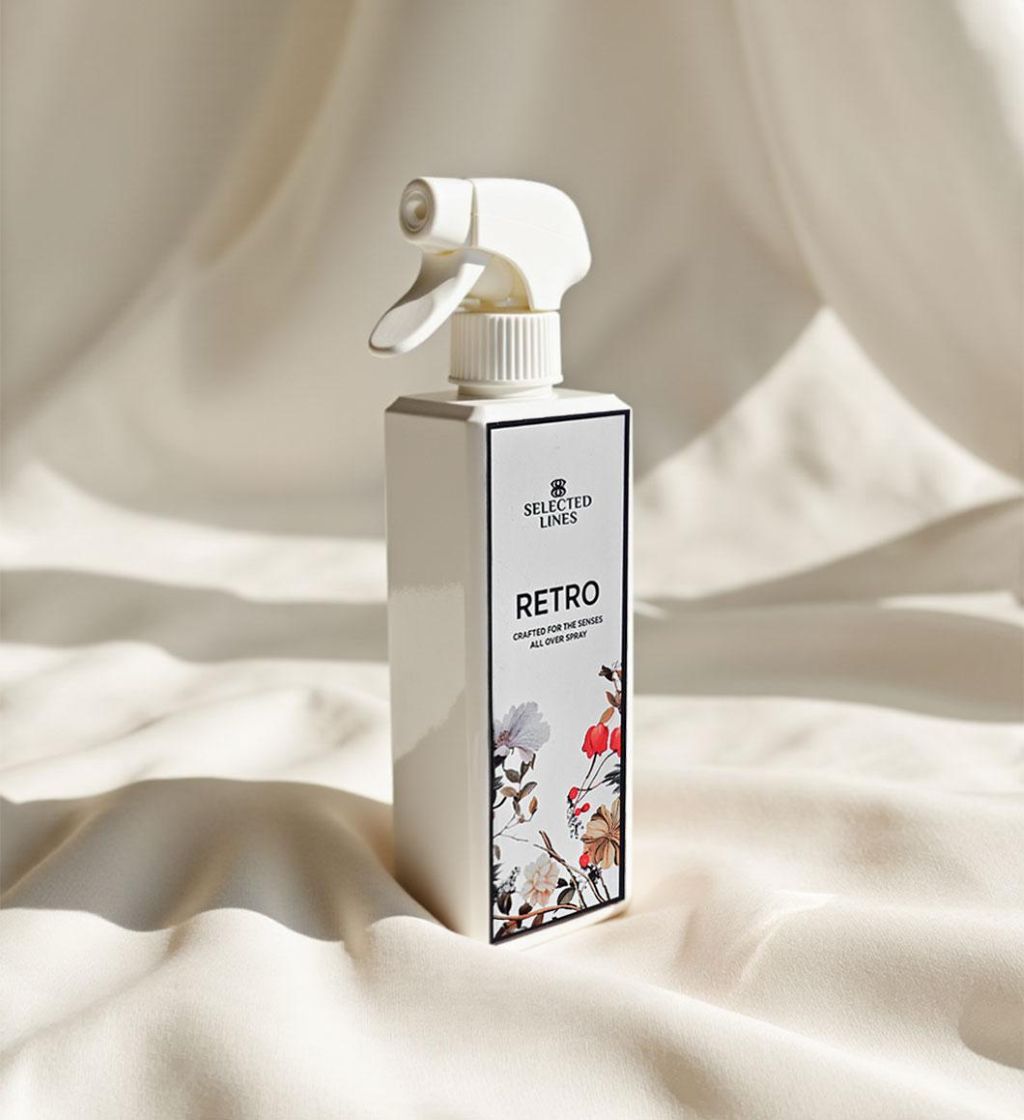 Selected Lines retro fabric spray in a white bottle with floral design for refreshing upholstery