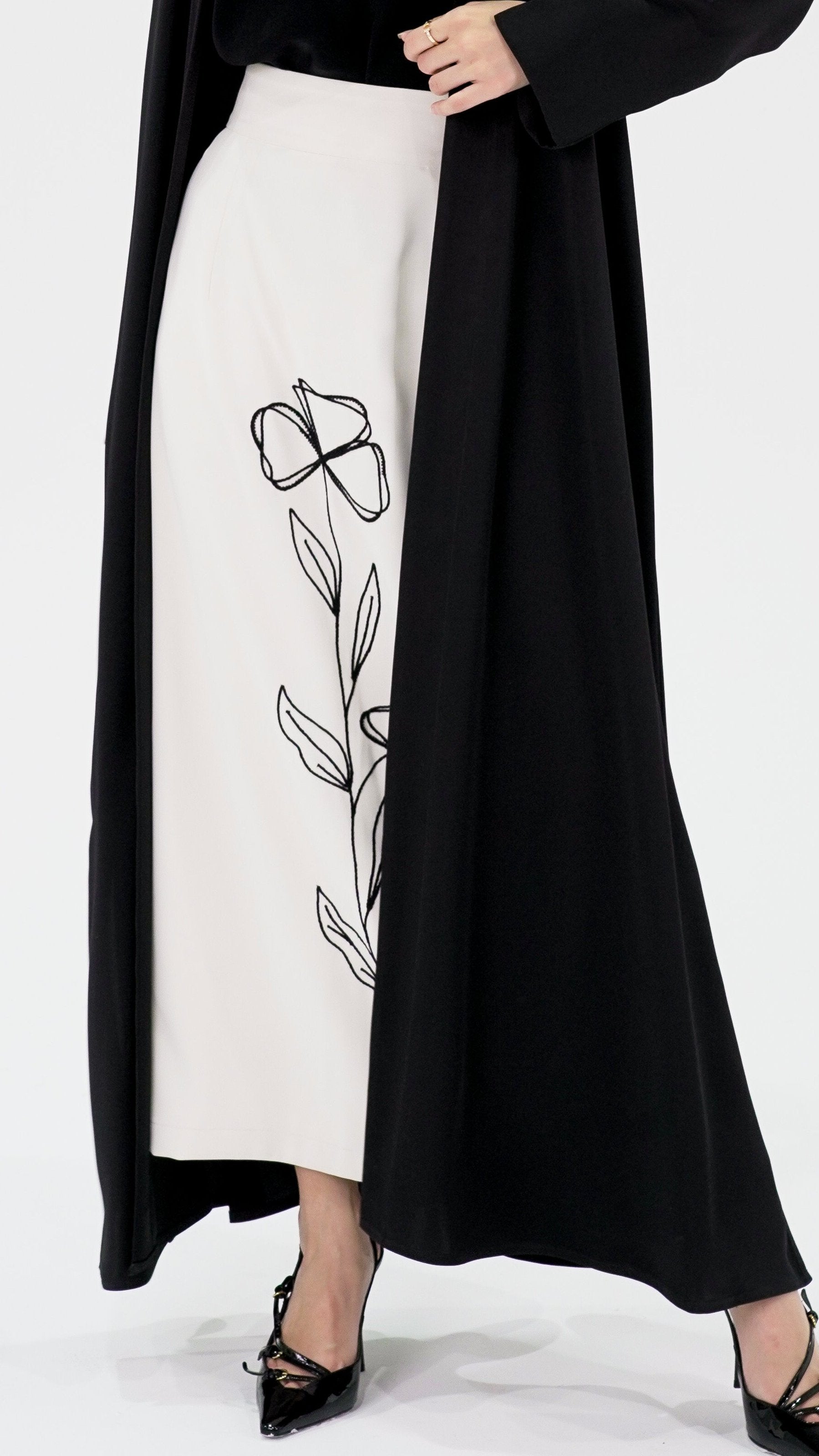 Close-up of Skirt Abaya’s 3D floral embellishments on premium black Nada fabric | Selected Lines