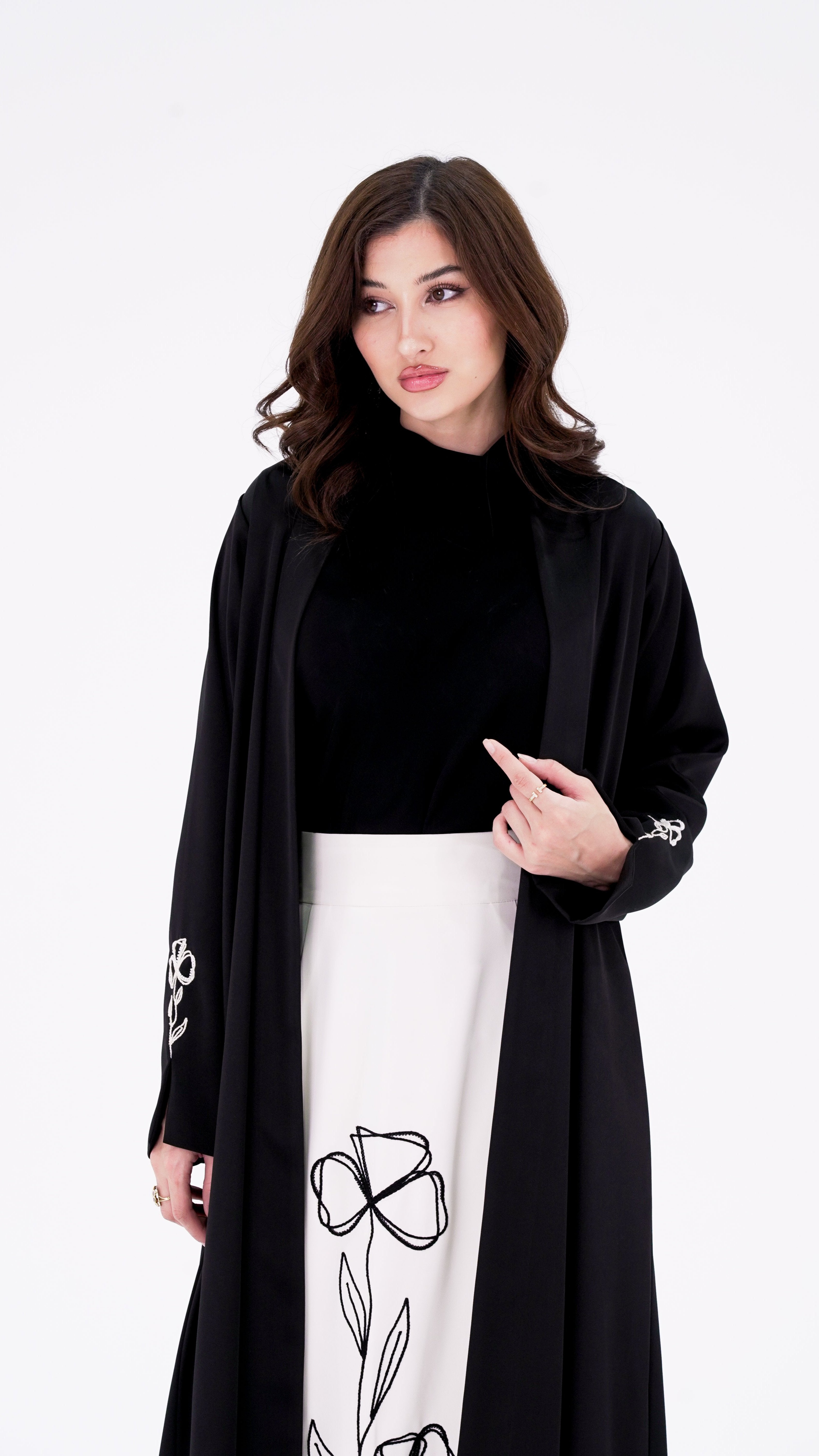 Skirt Abaya paired with matching top, offering a chic and sophisticated ensemble for special occasions | Selected Lines