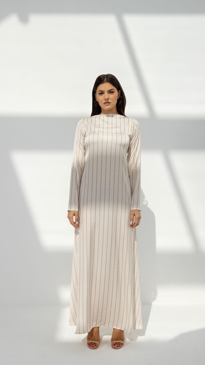 Front view of SLC Signature Dress featuring custom SLC printed typing fabric with unique boat neckline and back X design | Selected Lines