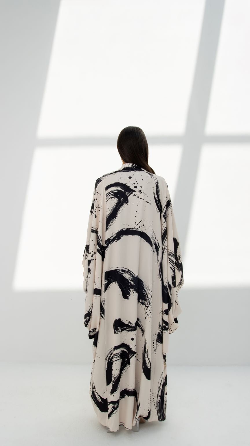 Back view of SLC Wide Abaya showcasing the flowing Bahraini-inspired silhouette | Selected Lines