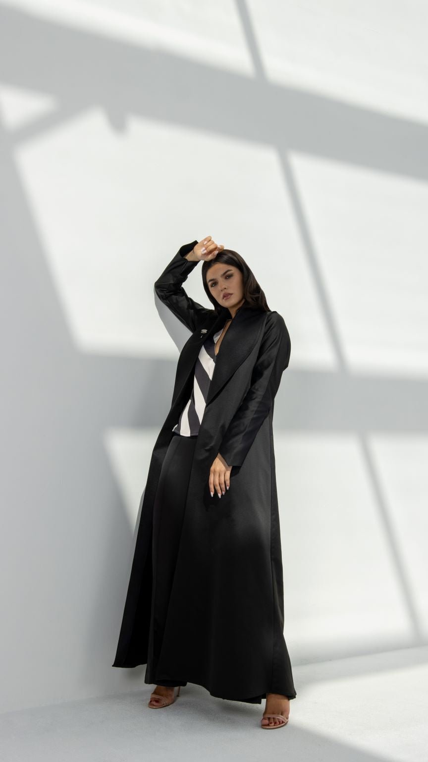 Smart Abaya paired with matching top and skirt set in black matte and shiny fabric | Selected Lines