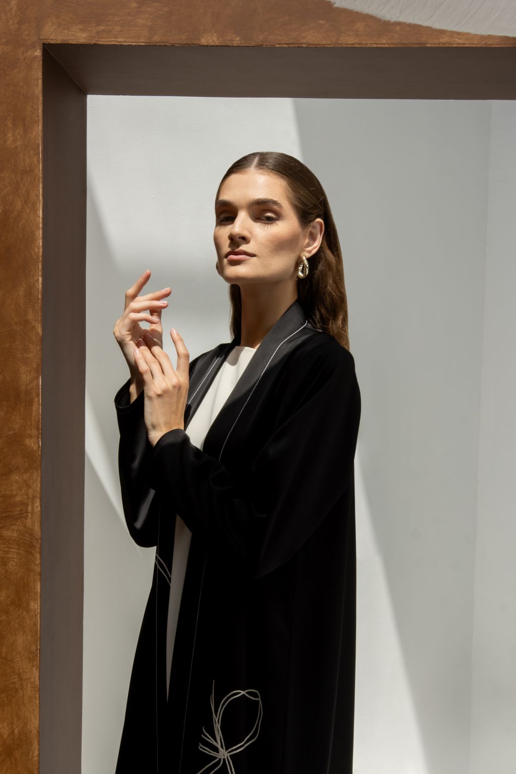 Selected Lines black threaded Bloom floral abaya for women with elegant white stitching detail