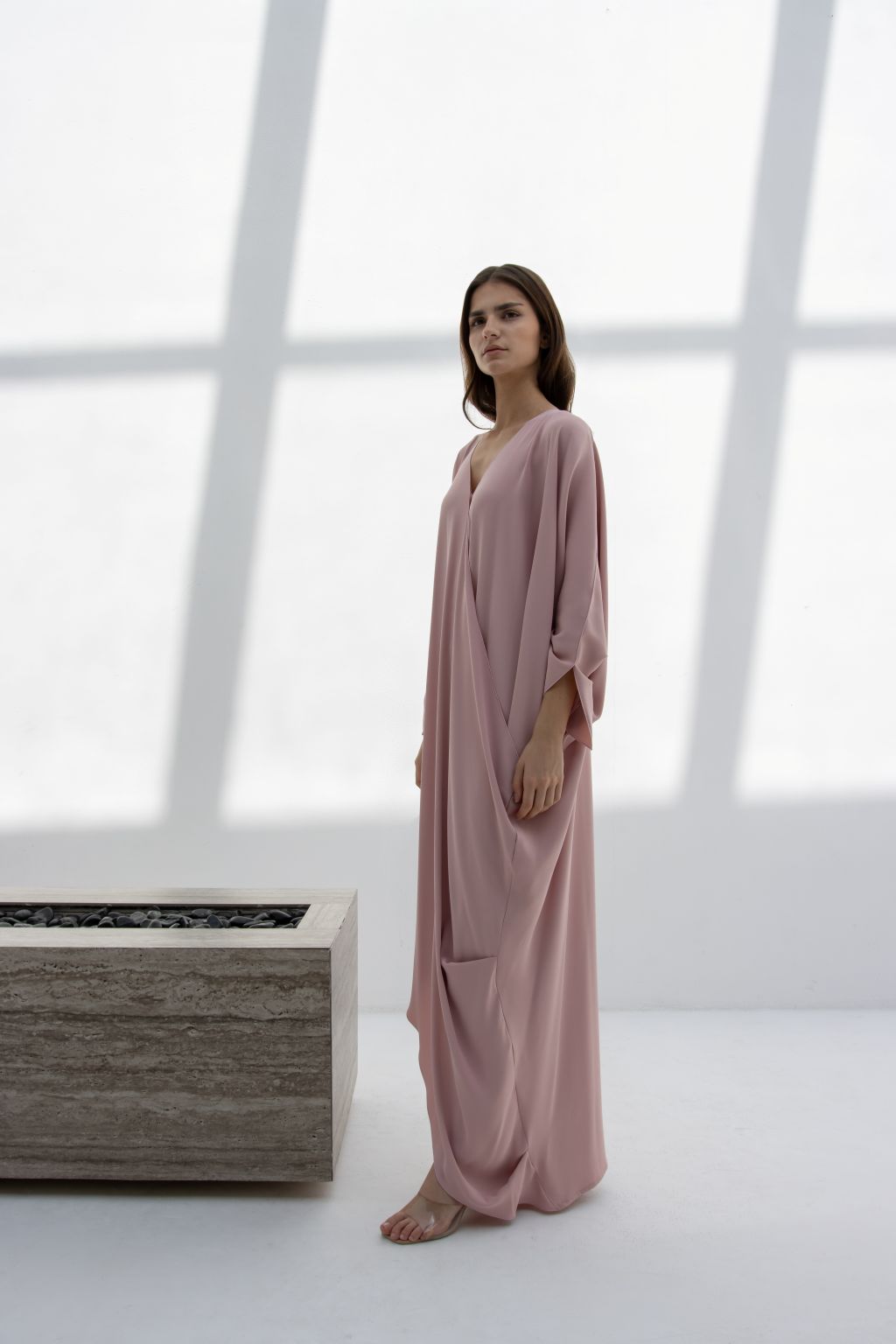 Elegant Selected Lines inner dress in soft pink, showcasing a timeless designer evening gown style