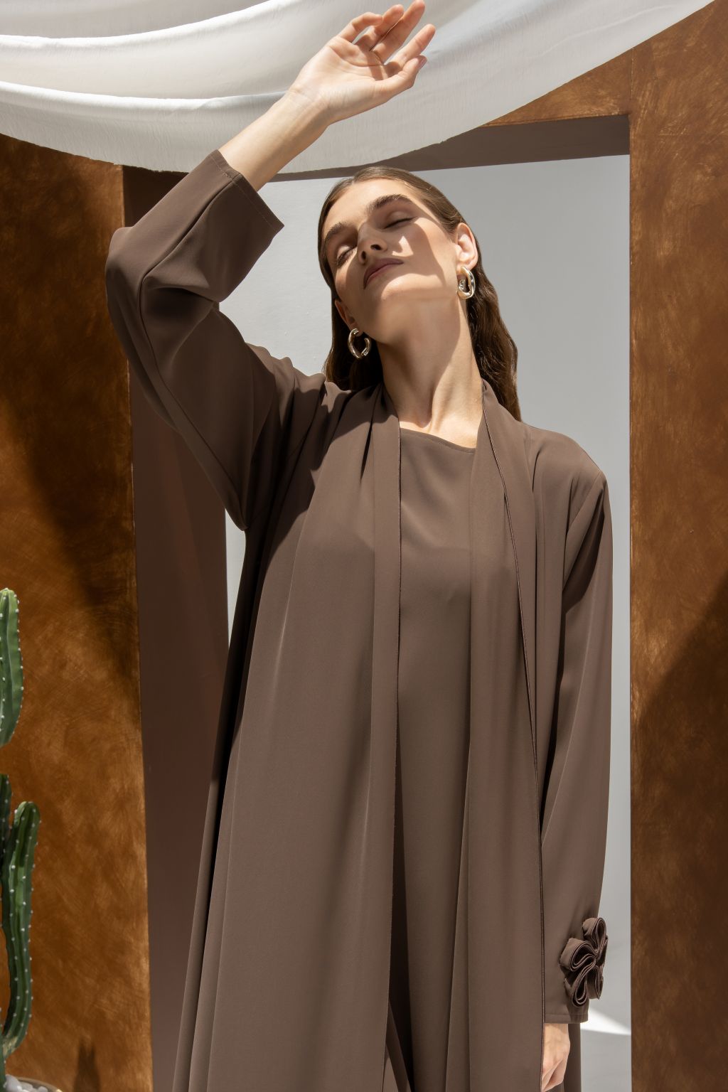 Selected Lines brown abaya for timeless modest evening wear with elegant long sleeves and draped design