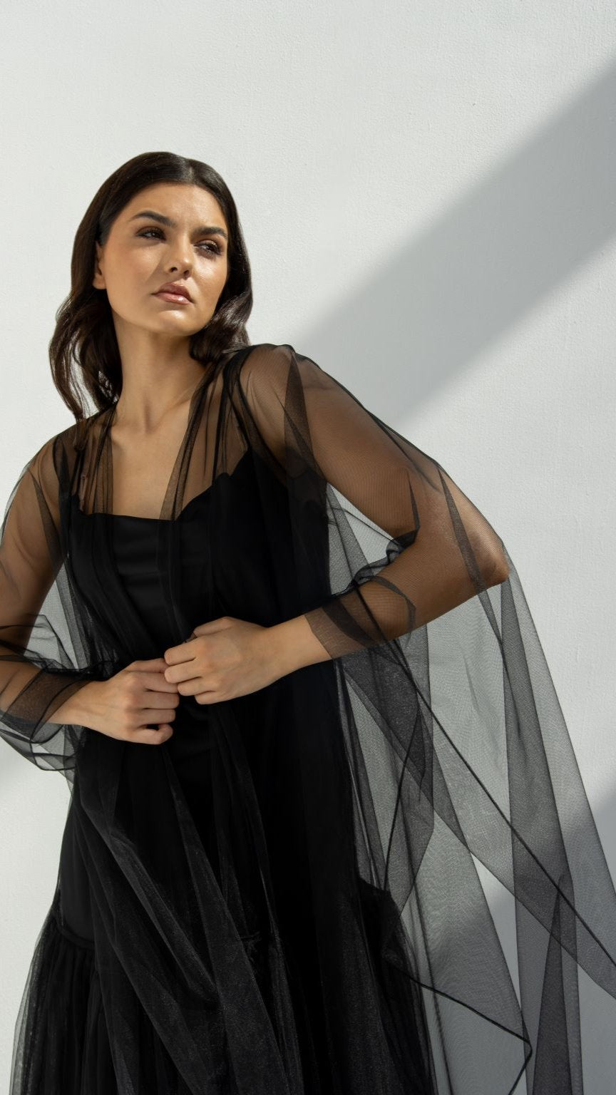 Front view of Tulle Skirt Abaya in black non-stretch tulle fabric | Selected Lines