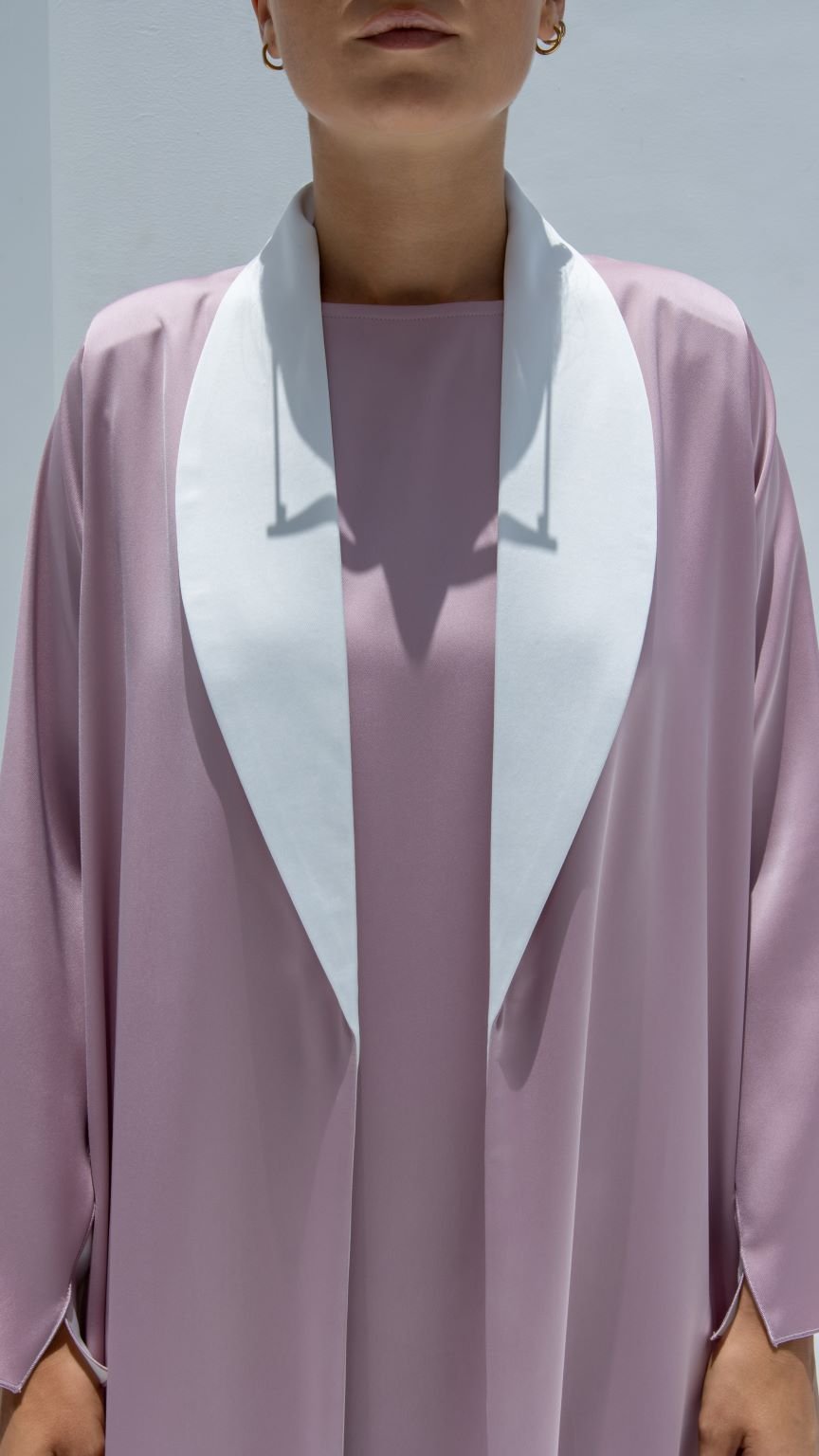 Front view of Two Tone Jacket Abaya in pink and white shiny crepe fabric | Selected Lines