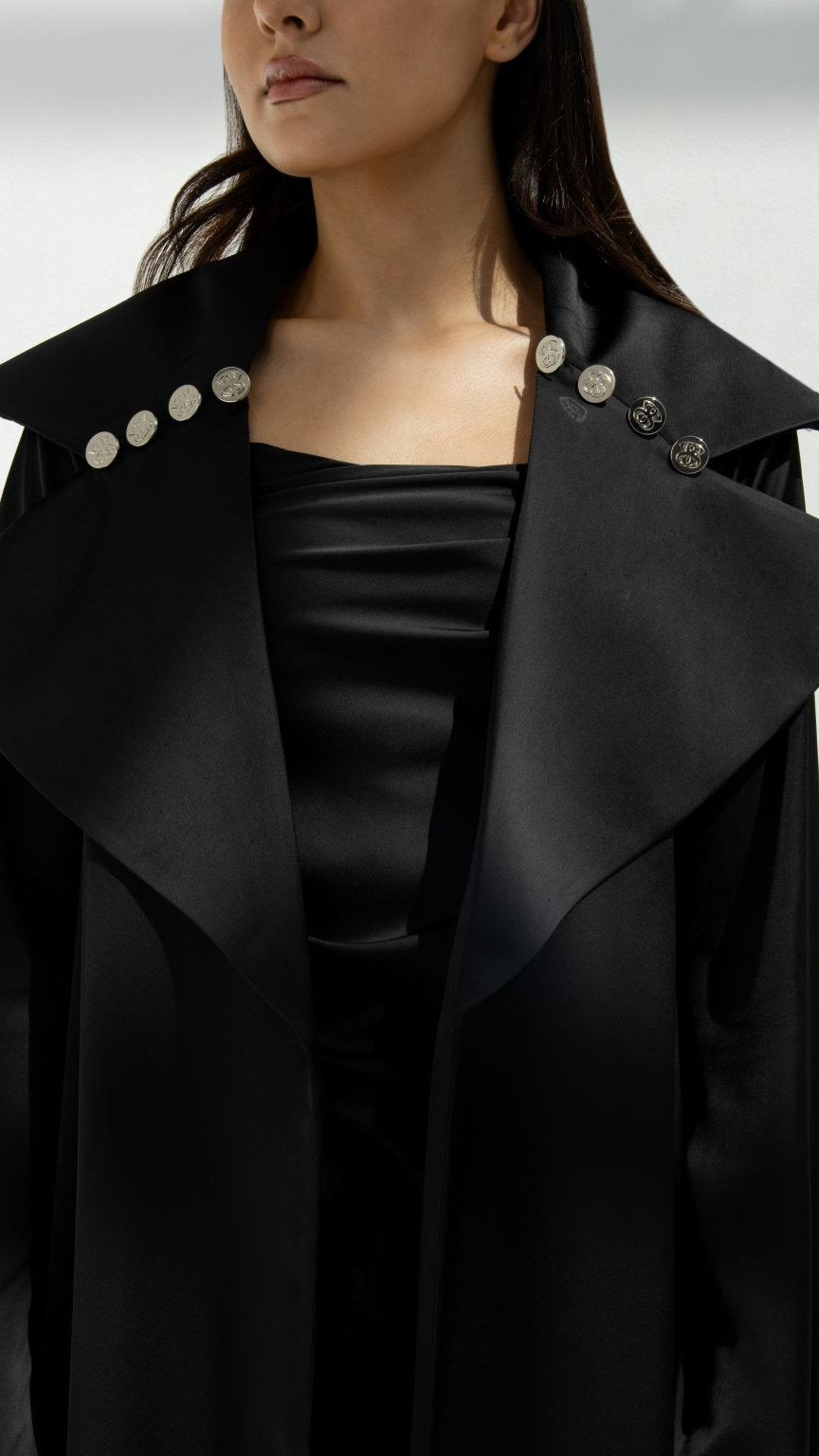 Selected Lines elegant abaya coat in black with silver button details on wide collar
