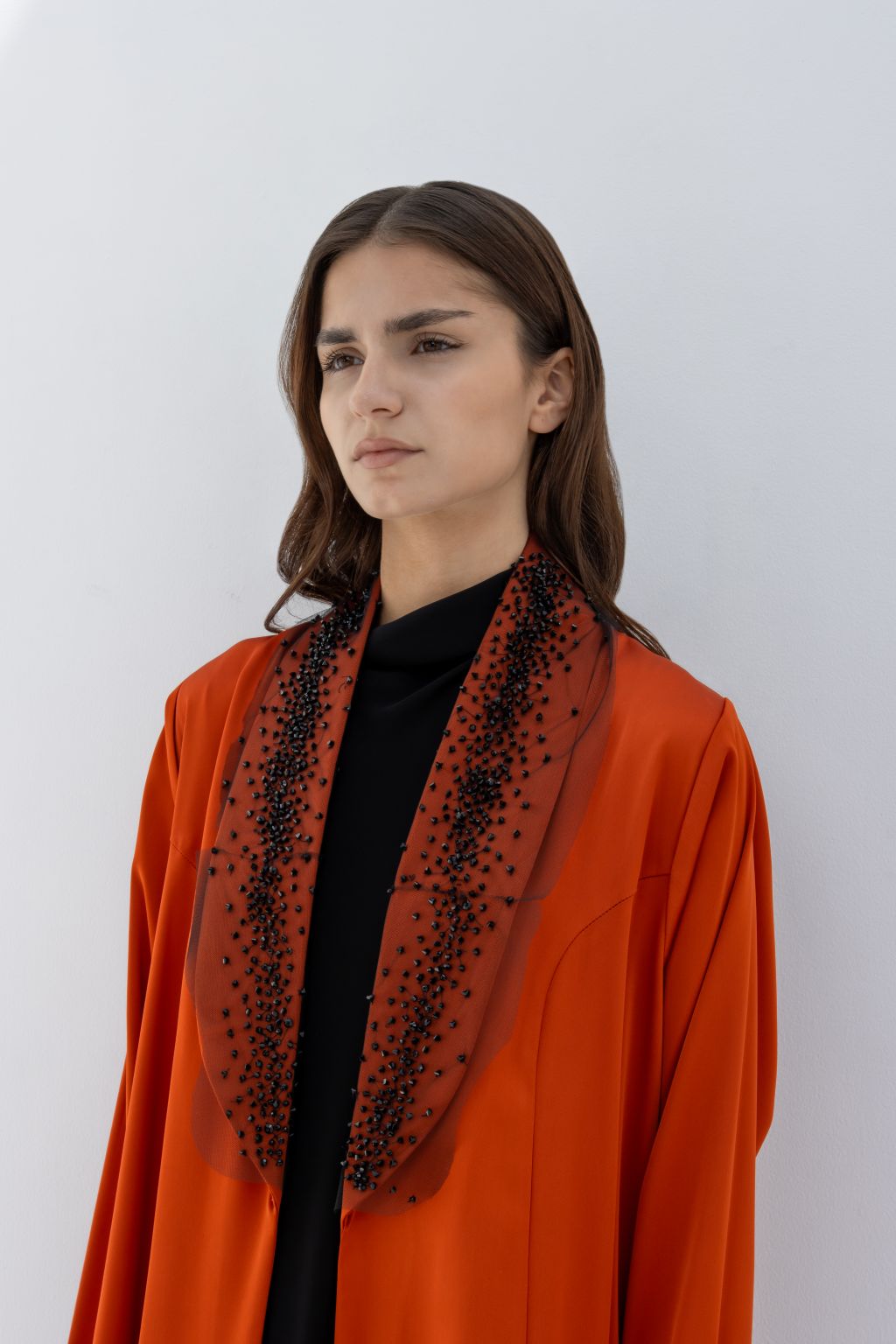 Selected Lines elegant tulle evening abaya in burnt orange with black embellished collar