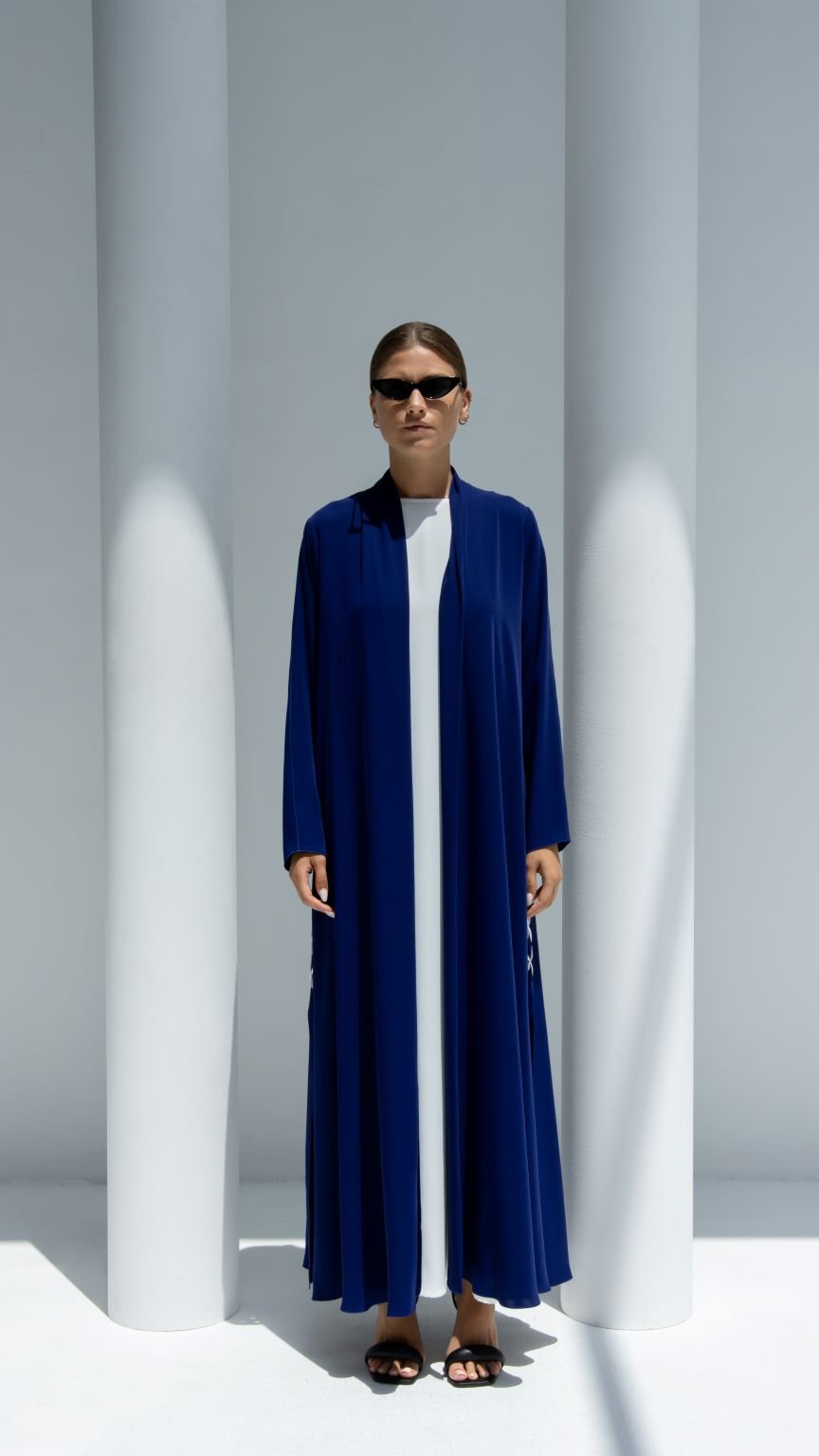 Front view of X-Abaya in electric blue Japan crepe fabric with side open design | Selected Lines