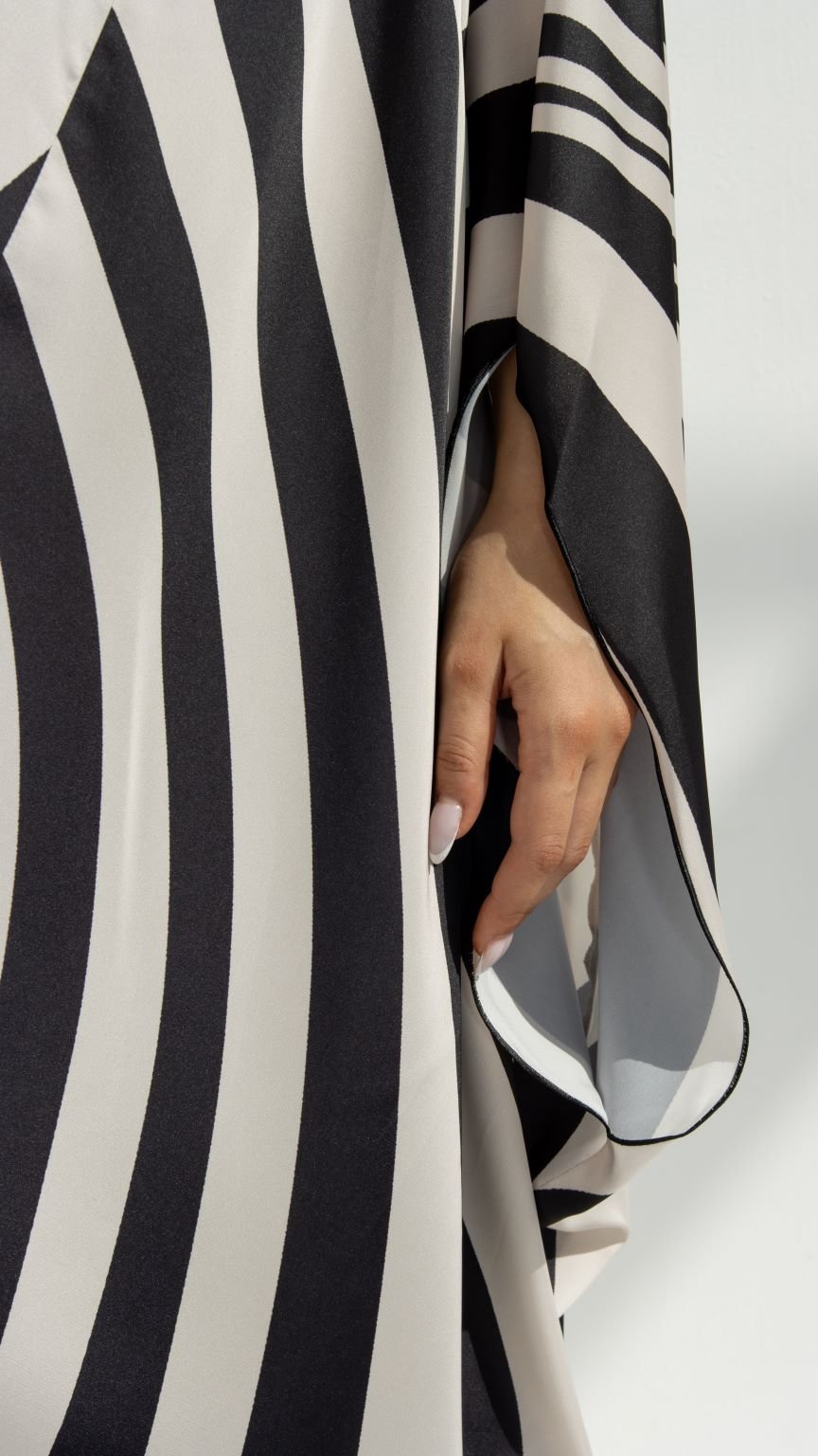 Close-up of Zebra-Hoodie Abaya’s SLC printed zebra fabric and design details | Selected Lines