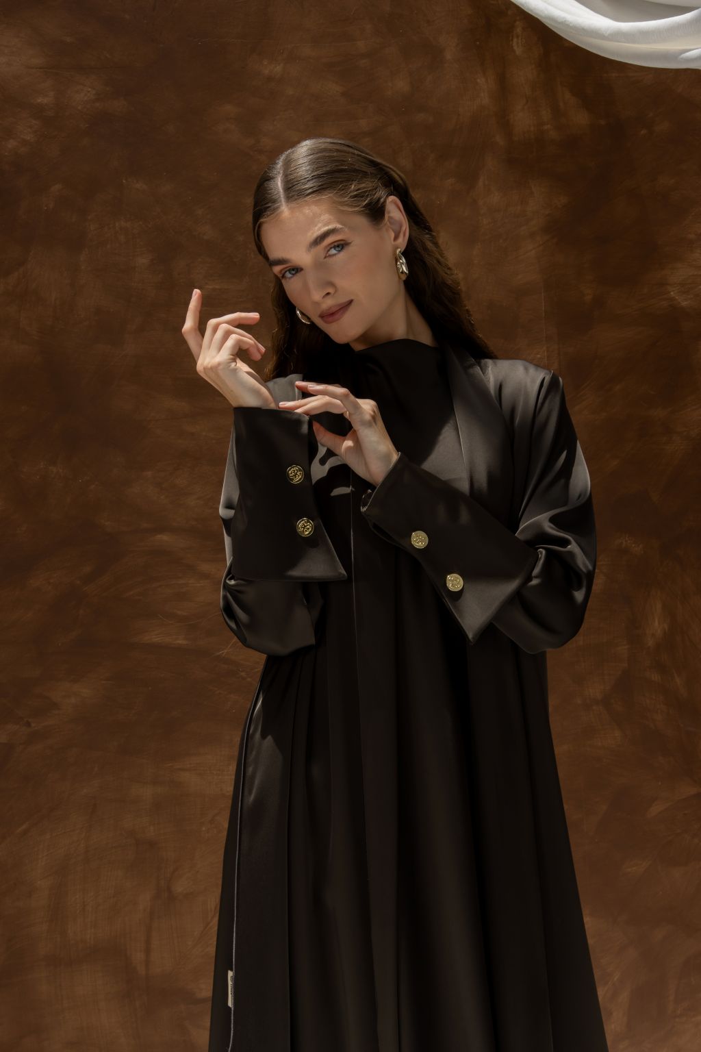 Black elegant evening dress abaya by Selected Lines with long sleeves and gold button details