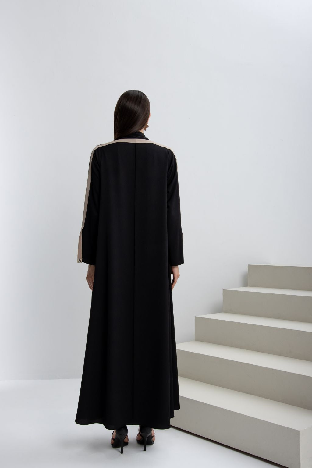 Elegant black designer abaya dress for occasions with stylish detailing and flowing silhouette