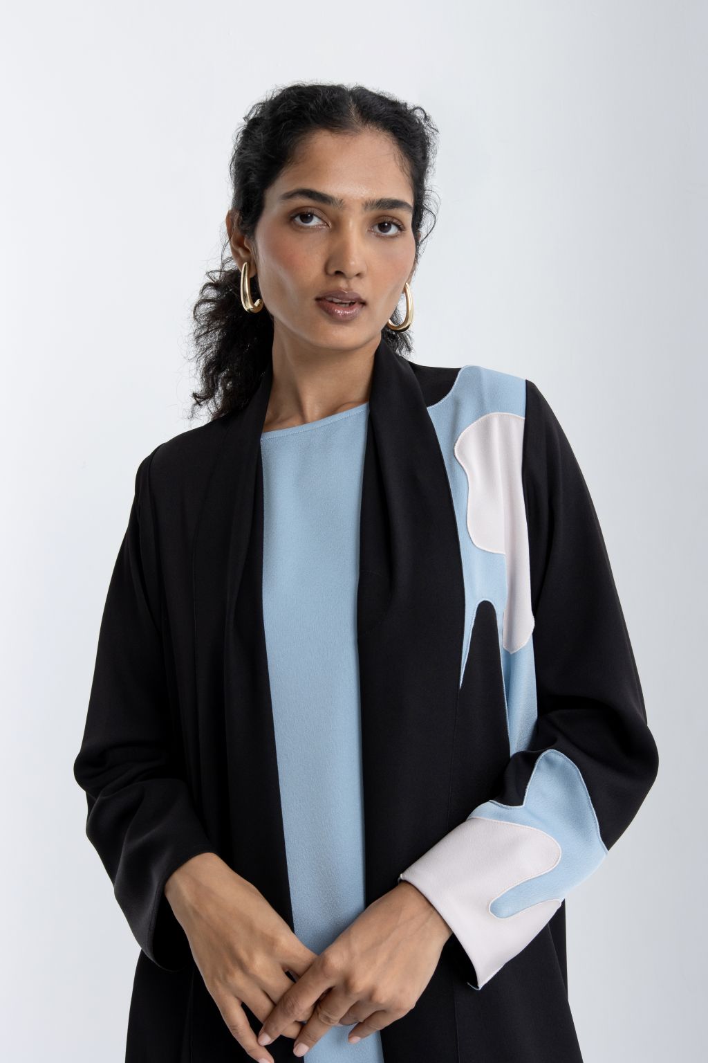 Elegant black and blue abaya featuring stylish design and elegant color contrast