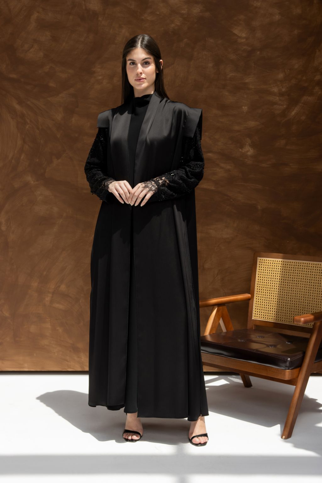 Elegant black evening dress designed by Selected Lines with stylish layered sleeves and flattering silhouette