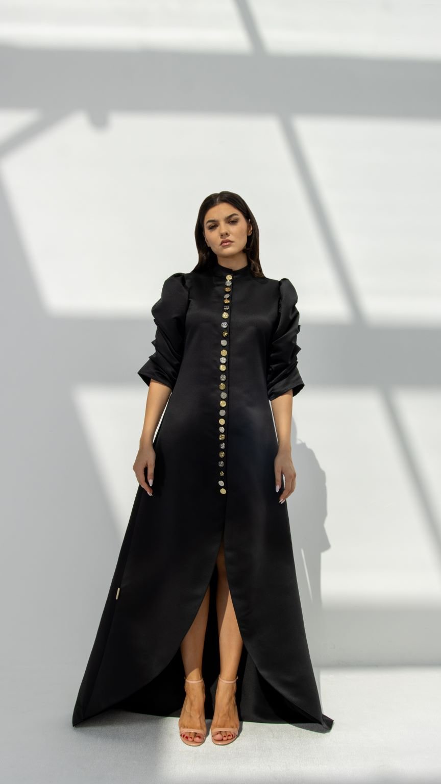 Selected Lines elegant button line dress in black with long sleeves and front gold buttons