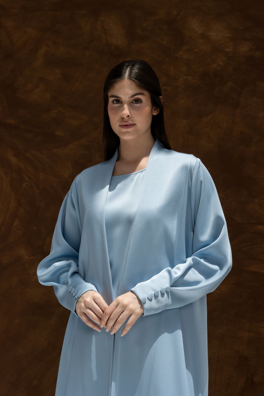 Elegant Buttoned Breeze blue abaya by Selected Lines with long sleeves and relaxed fit