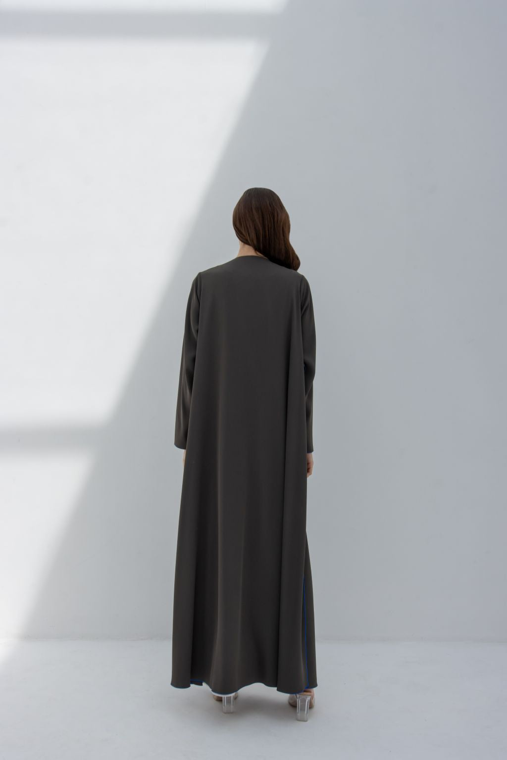 Selected Lines elegant Curve Buttons abaya in black with long sleeves shown from back