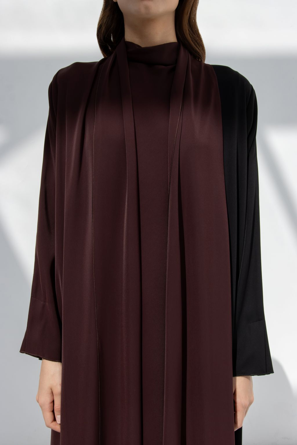 Selected Lines elegant half moon dress abaya in black and dark brown with flowing fabric details