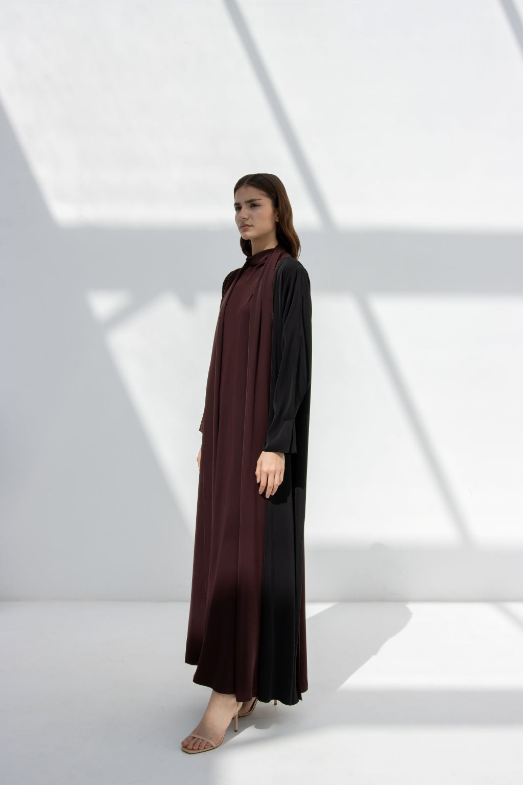 Selected Lines elegant half moon dress abaya in black and maroon with long sleeves and modest design