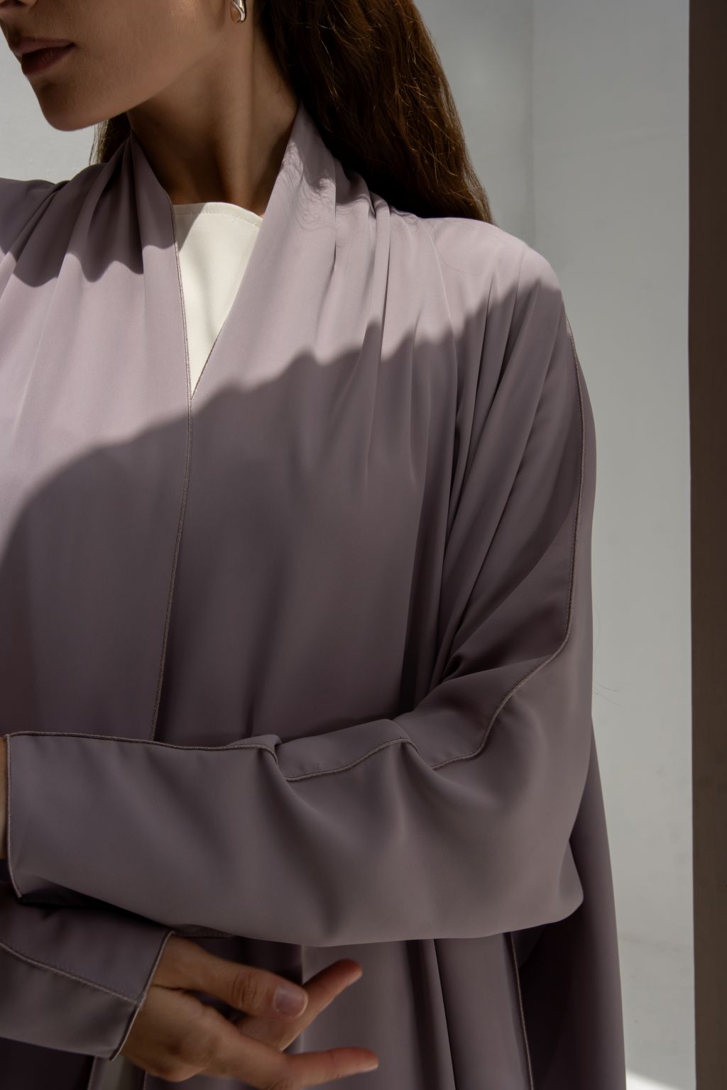 Selected Lines elegant signature abaya in soft fabric with flowing sleeves and minimalist design