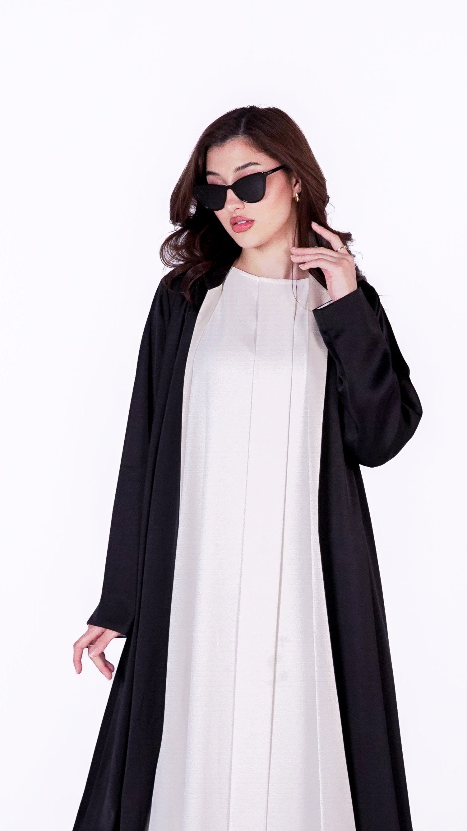 Elegant twist abaya in black with a sleek design, perfect for sophisticated occasions