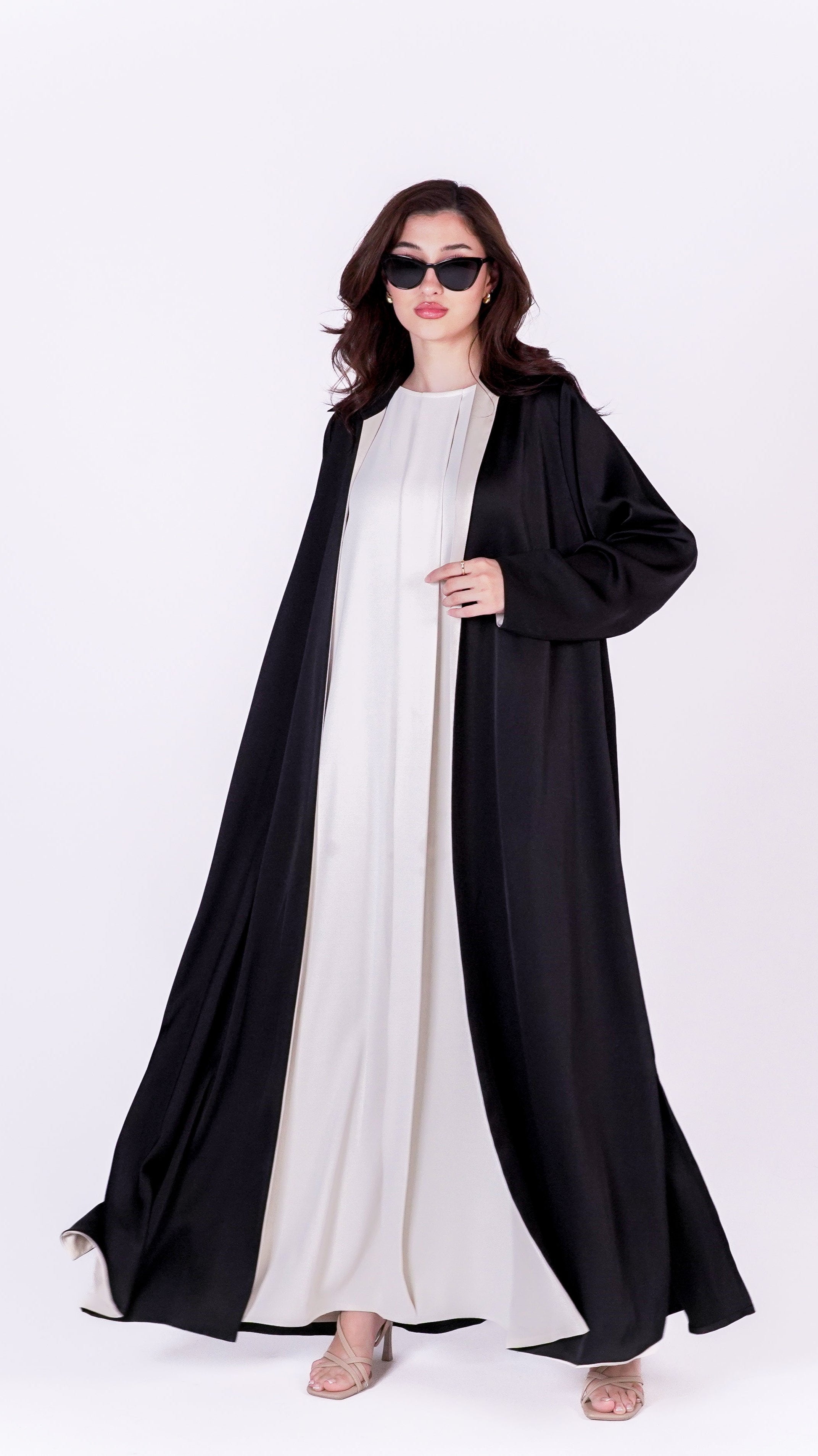 Elegant twist abaya in black with flowing design and stylish sleeves for a sophisticated look