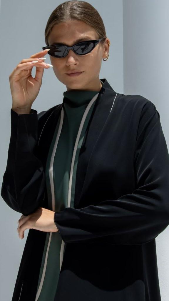 Elegant two lines abaya in black with stylish design suitable for modern occasions