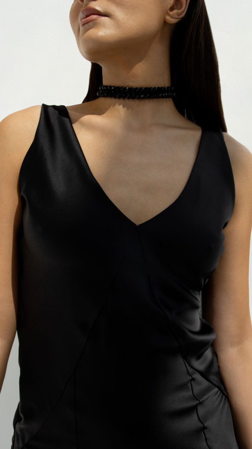 Selected Lines black high-end choker gown with sleek sleeveless design and deep v-neckline