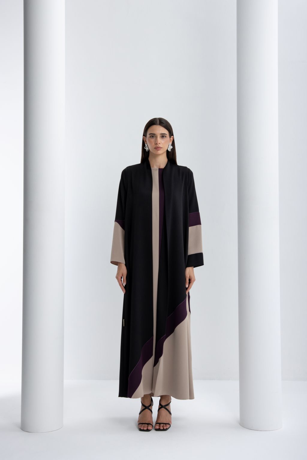 Elegant Selected Lines high quality abaya for special occasions in black and beige with unique color blocking